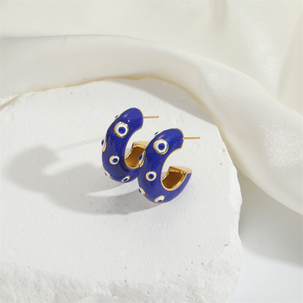 Merlina aretes